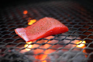 seasoned salmon on the grill